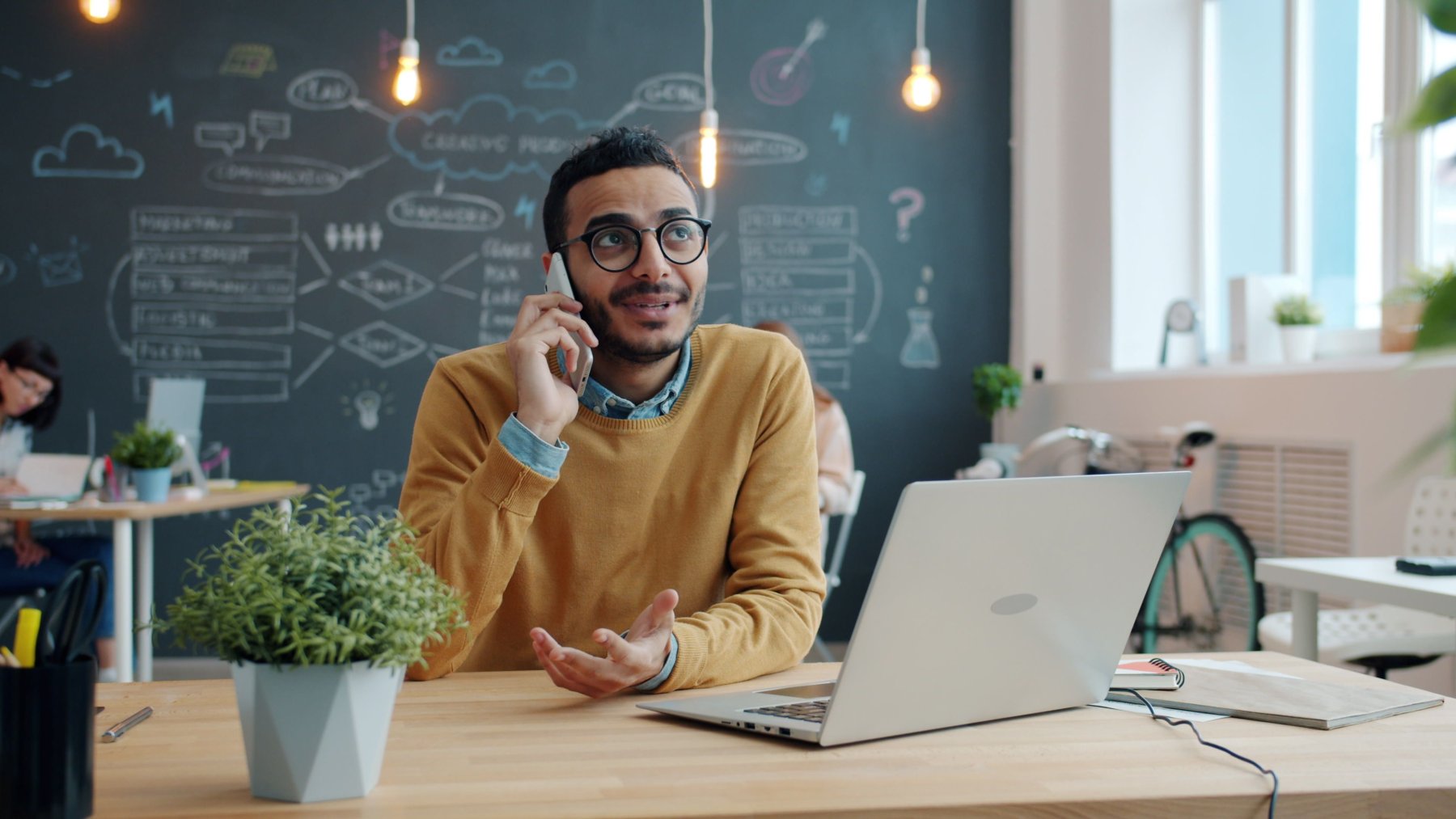 Professional working with a laptop in an office